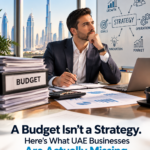 UAE business professional reviewing a budget and strategic growth plan in a Dubai office